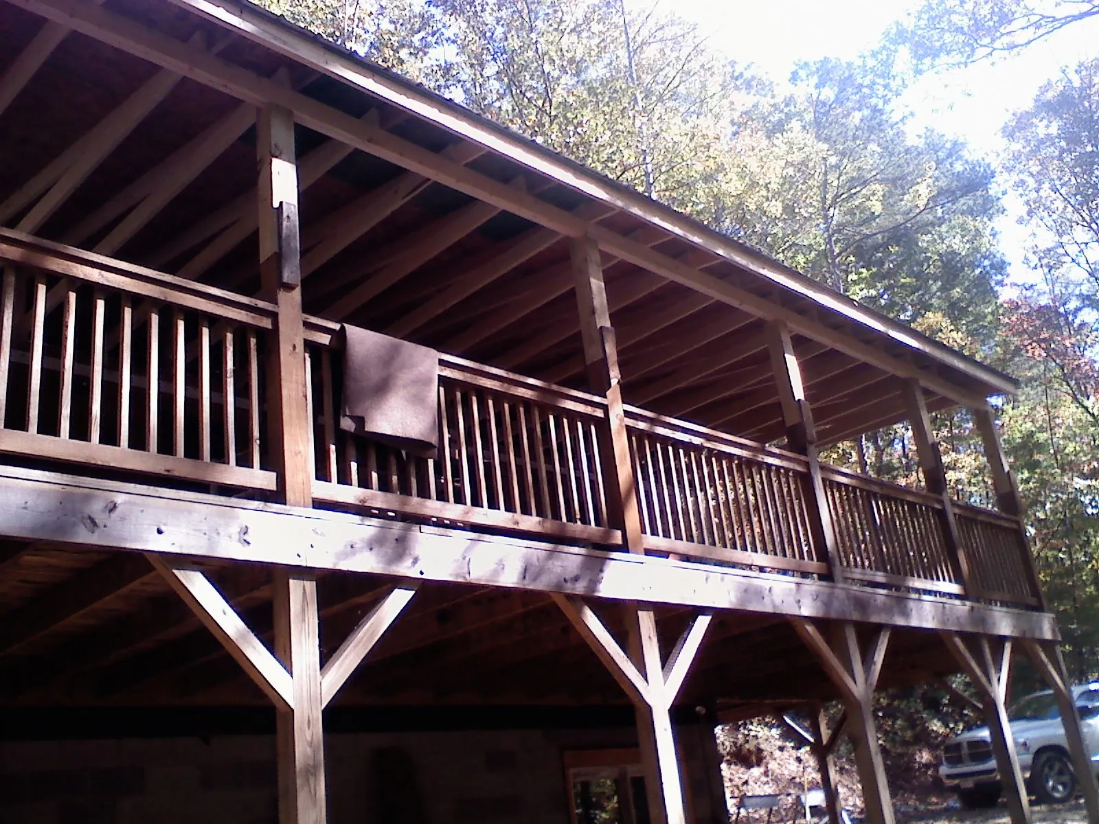 Timber framing under a new elevated porch and deck — Roof Leak Repair in Tremont by Roofing Brothers